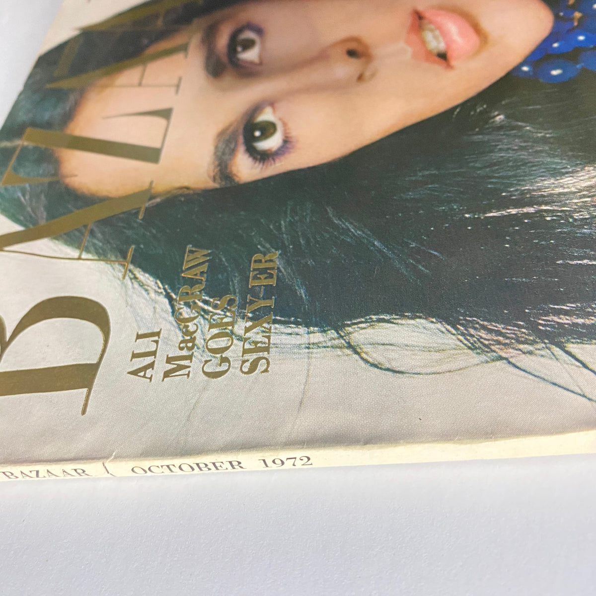 Close-up view of the cover of Harper's Bazaar Magazine, October 1972, highlighting Ali MacGraw and capturing the essence of 1970s fashion.