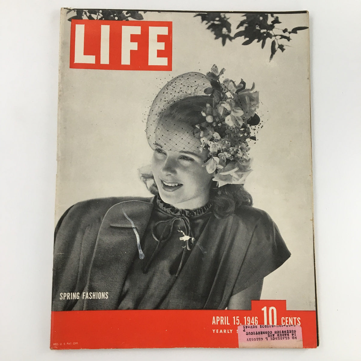 Cover of VTG Life Magazine April 15 1946 showcasing Spring Fashions, featuring a woman adorned with a floral hat and veil, highlighting post-war fashion trends.