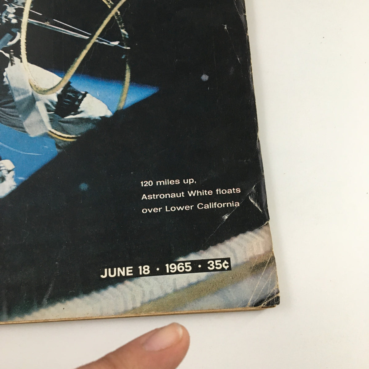 Close-up of the cover of VTG Life Magazine June 18, 1965, highlighting Astronaut White's historic spacewalk details and publication date.