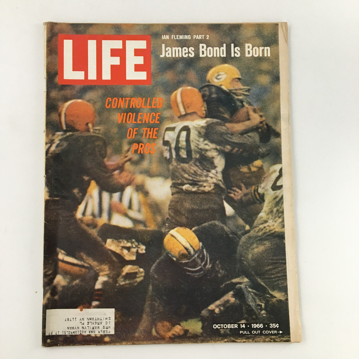 Cover of Life Magazine from October 14, 1966, featuring 'Ian Fleming Part 2: James Bond is Born'. The cover highlights the themes of controlled violence in professional sports, with an action-packed image of football players in a dramatic moment on the field.