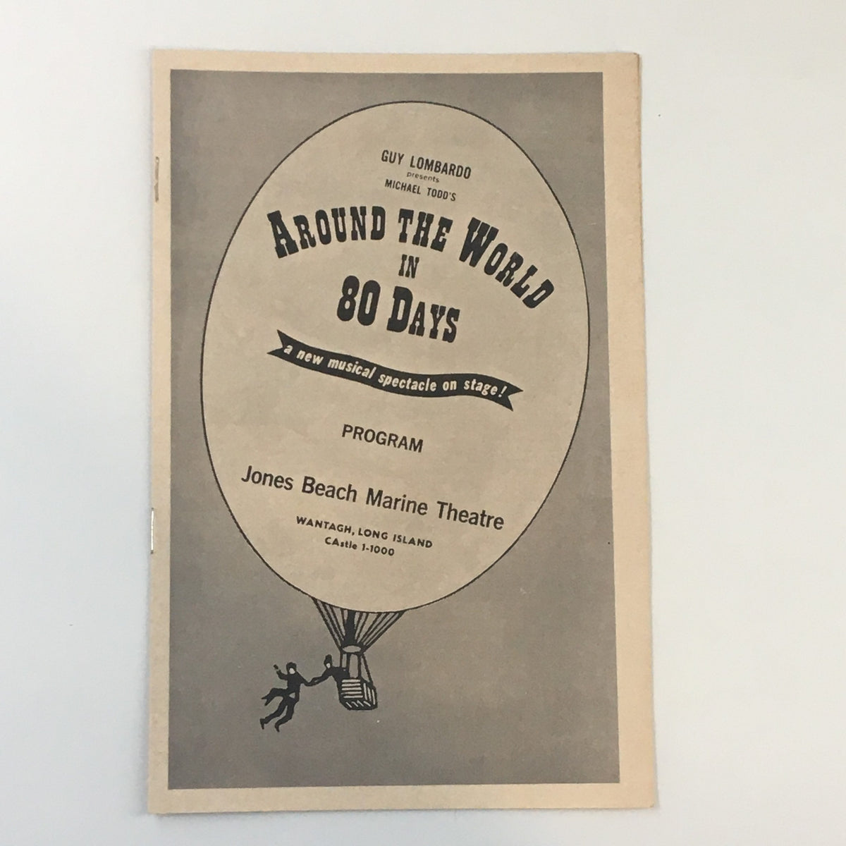 Vintage program cover for 'Around The World in 80 Days' at Jones Beach Marine Theatre, 1960, featuring a classic hot air balloon design.