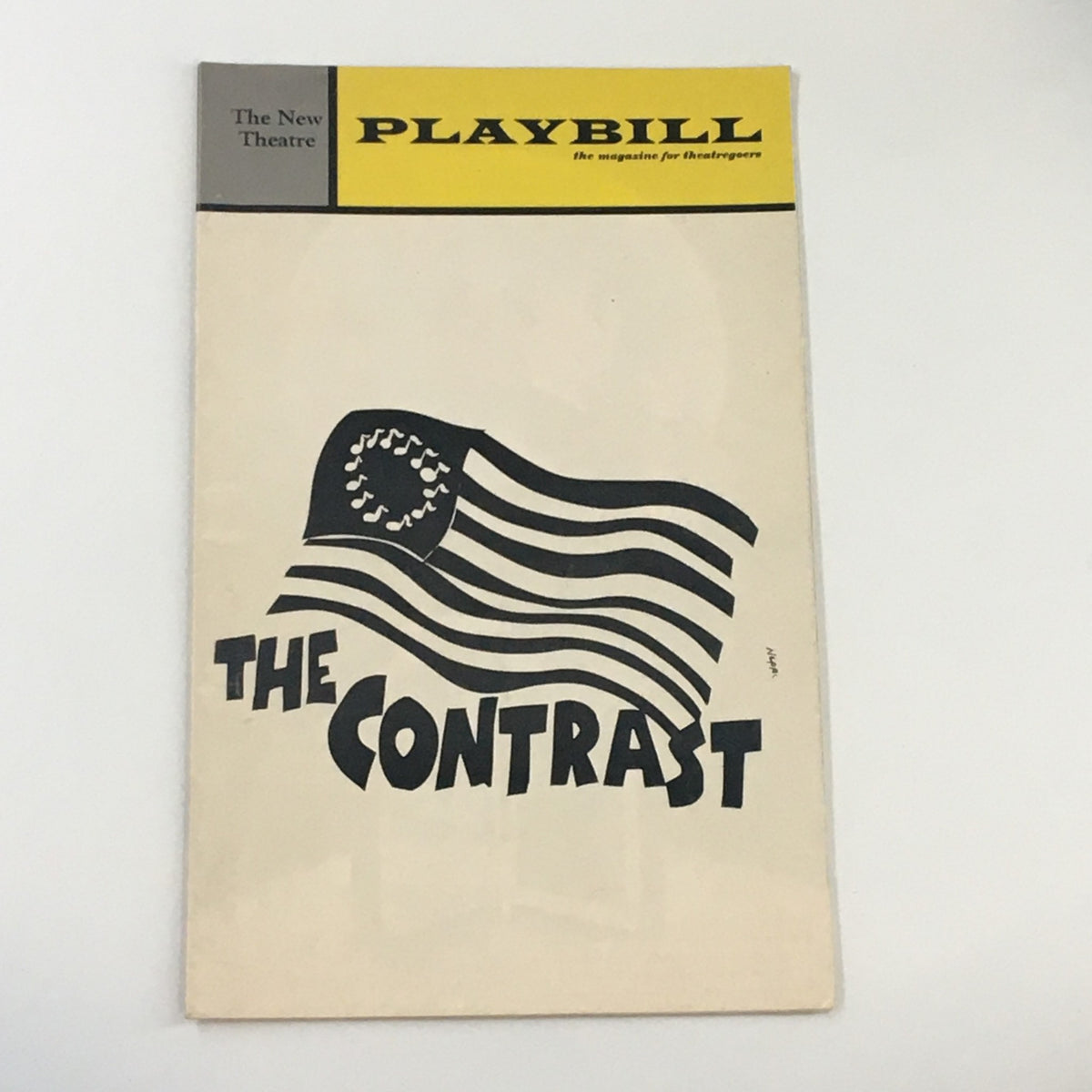 Cover of the 1972 Playbill for 'The Contrast' showcasing an artistic depiction of an American flag with bold lettering.