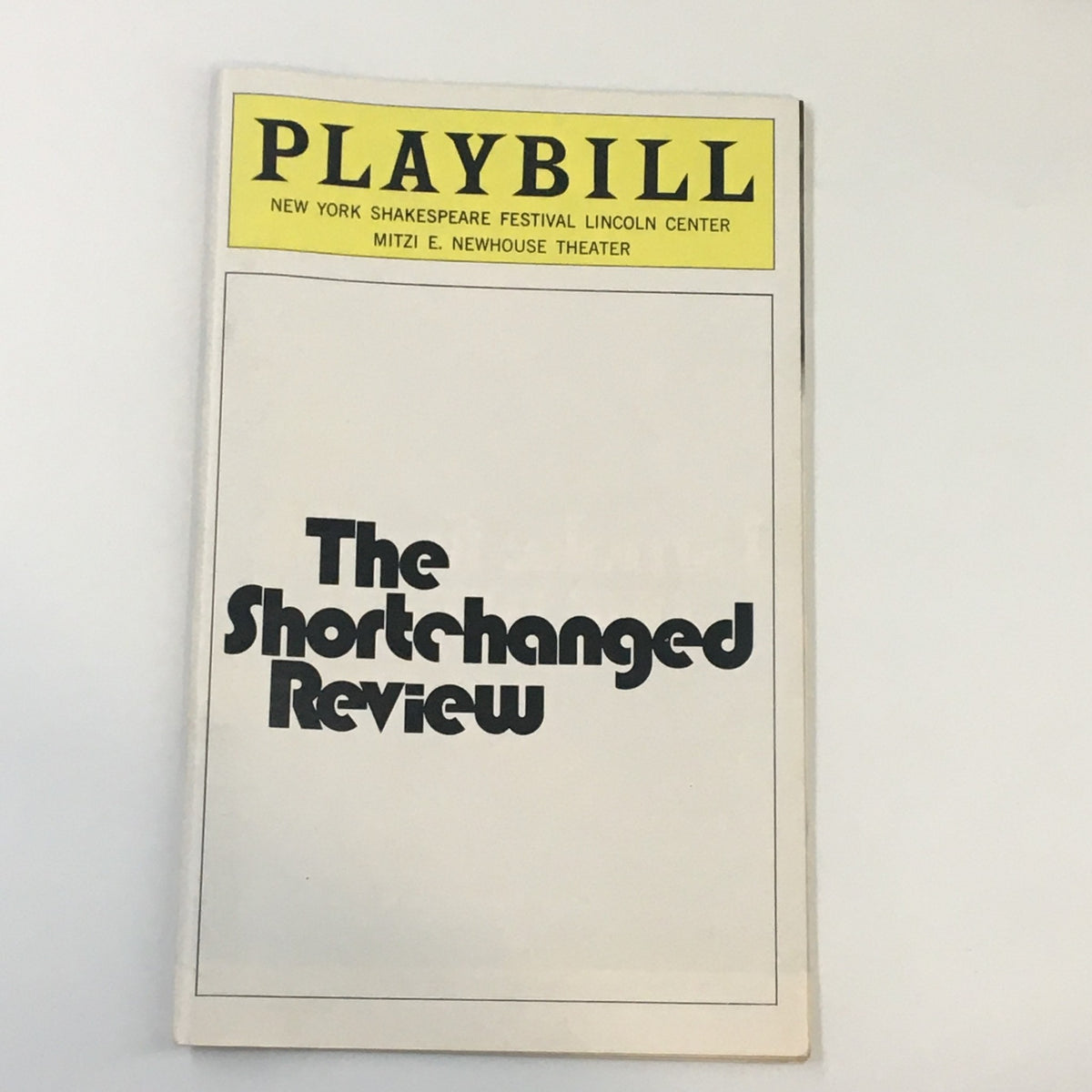 Front cover of the 1976 Playbill for New York Shakespeare Festival's The Shortchanged Review featuring bold text and theater branding.