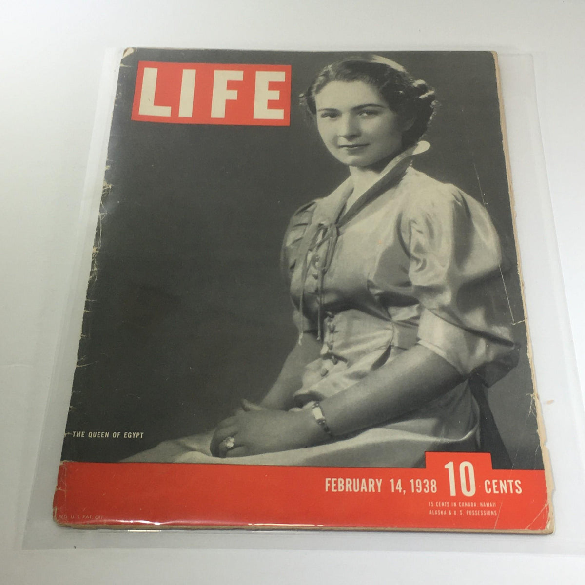 Vintage Life Magazine dated February 14, 1938 featuring The Queen Of Egypt on the cover, showcasing a vintage design with a striking central figure.