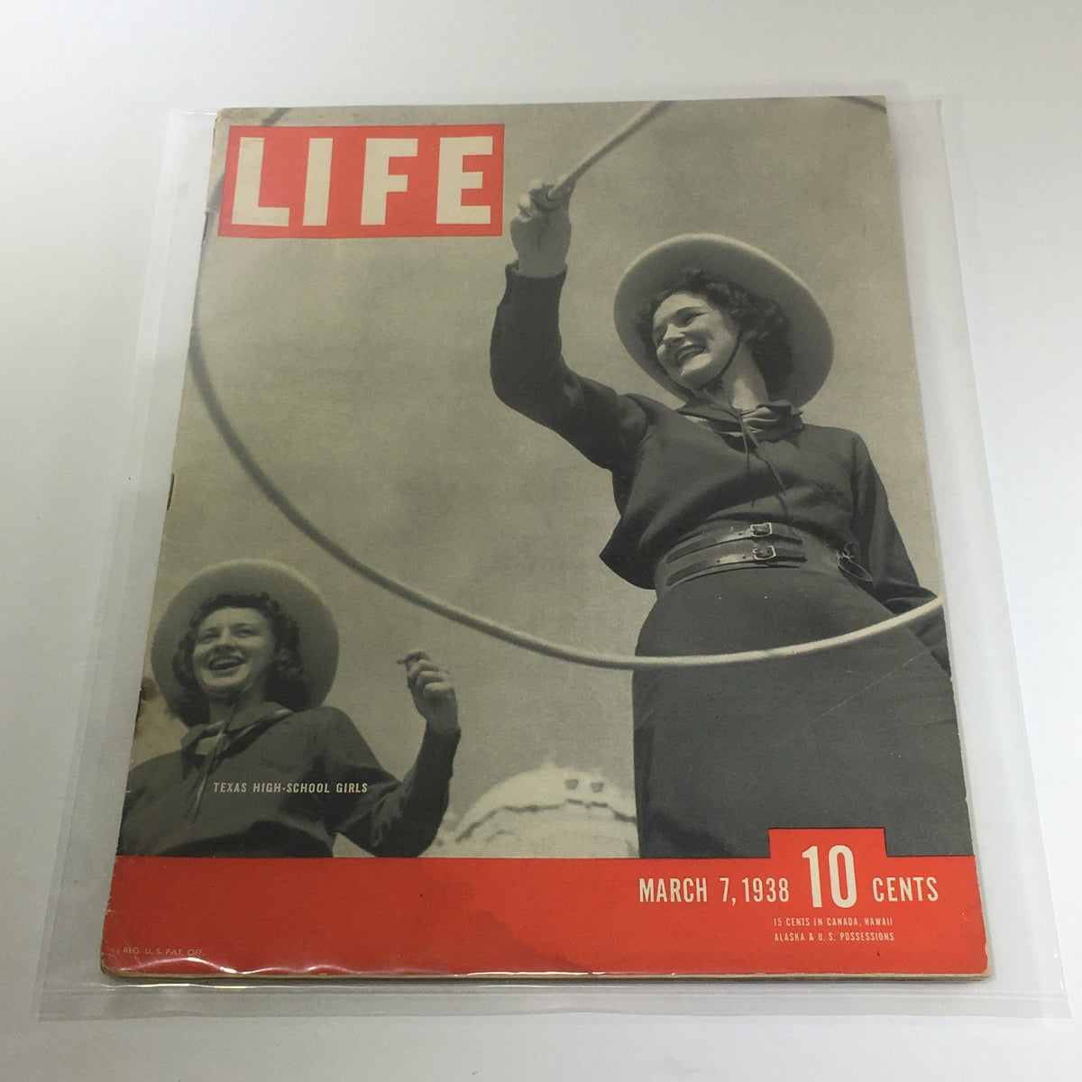 Vintage Life Magazine cover from March 7, 1938, featuring Texas high-school girls, showcasing women with hats and lariats, a snapshot of 1930s American culture.