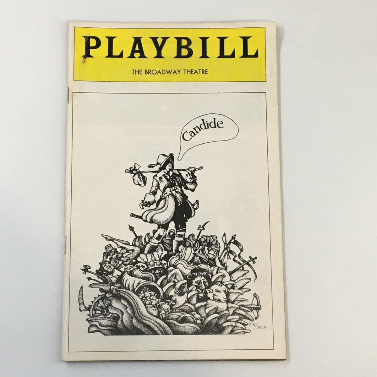 1974 Playbill from Broadway Theatre featuring Lewis J. Stadlen in the performance of Candide by Harold Prince, showcasing unique cover art with whimsical illustrations.