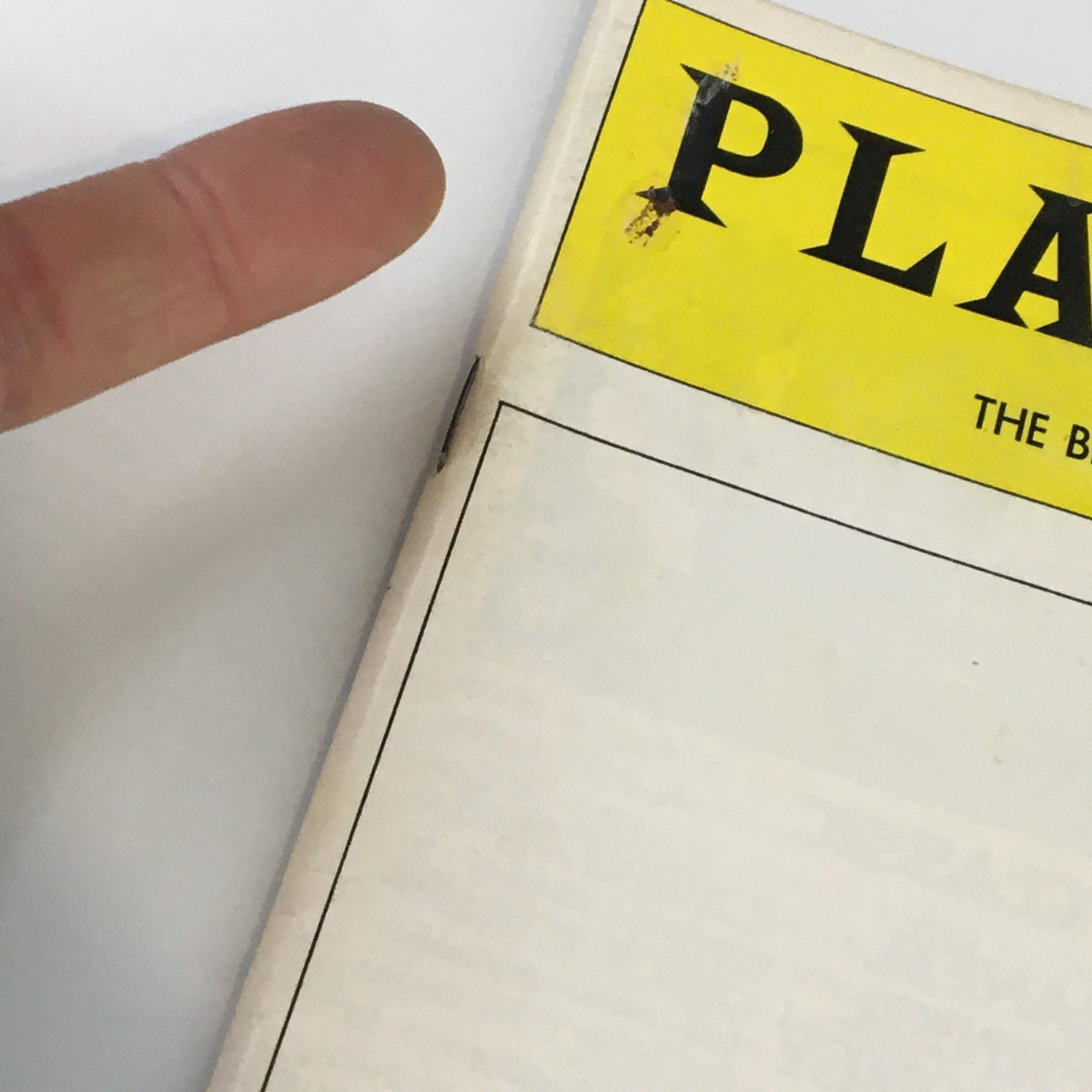 Front view of the 1974 Playbill for Broadway Theatre featuring Lewis J. Stadlen in Candide by Harold Prince, displaying a distinctive yellow header and minor age-related wear.
