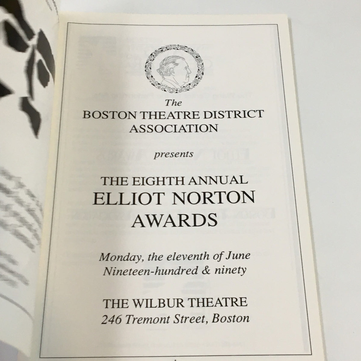 Inside page of the 1990 Wilbur Theatre The Eight Annual Elliot Norton Awards program detailing the event date and location at 246 Tremont Street, Boston.