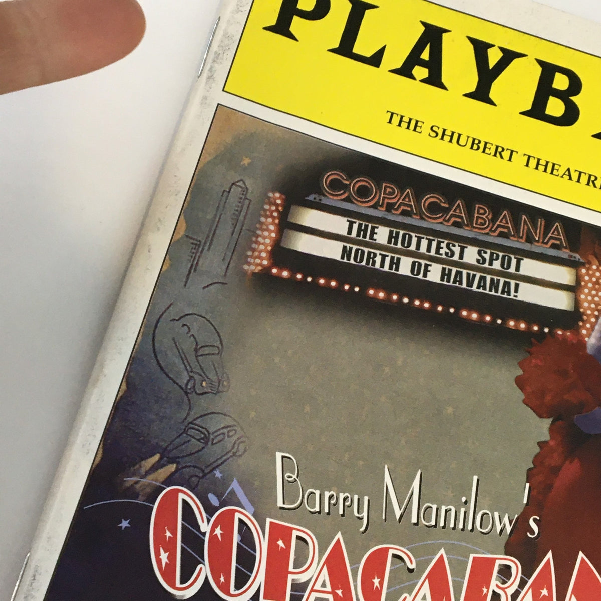 Close-up of the 2000 Playbill from The Shubert Theatre, highlighting Barry Manilow's Copacabana The Musical with detail on the title and artwork.