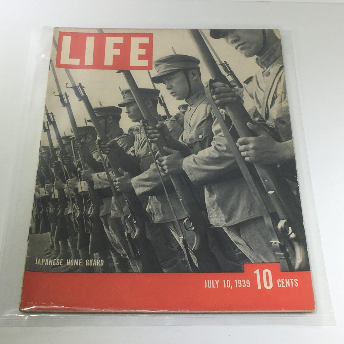 Vintage Life Magazine cover from July 10, 1939, featuring the Japanese Home Guard, showcasing soldiers in formation with rifles, capturing a historical moment.
