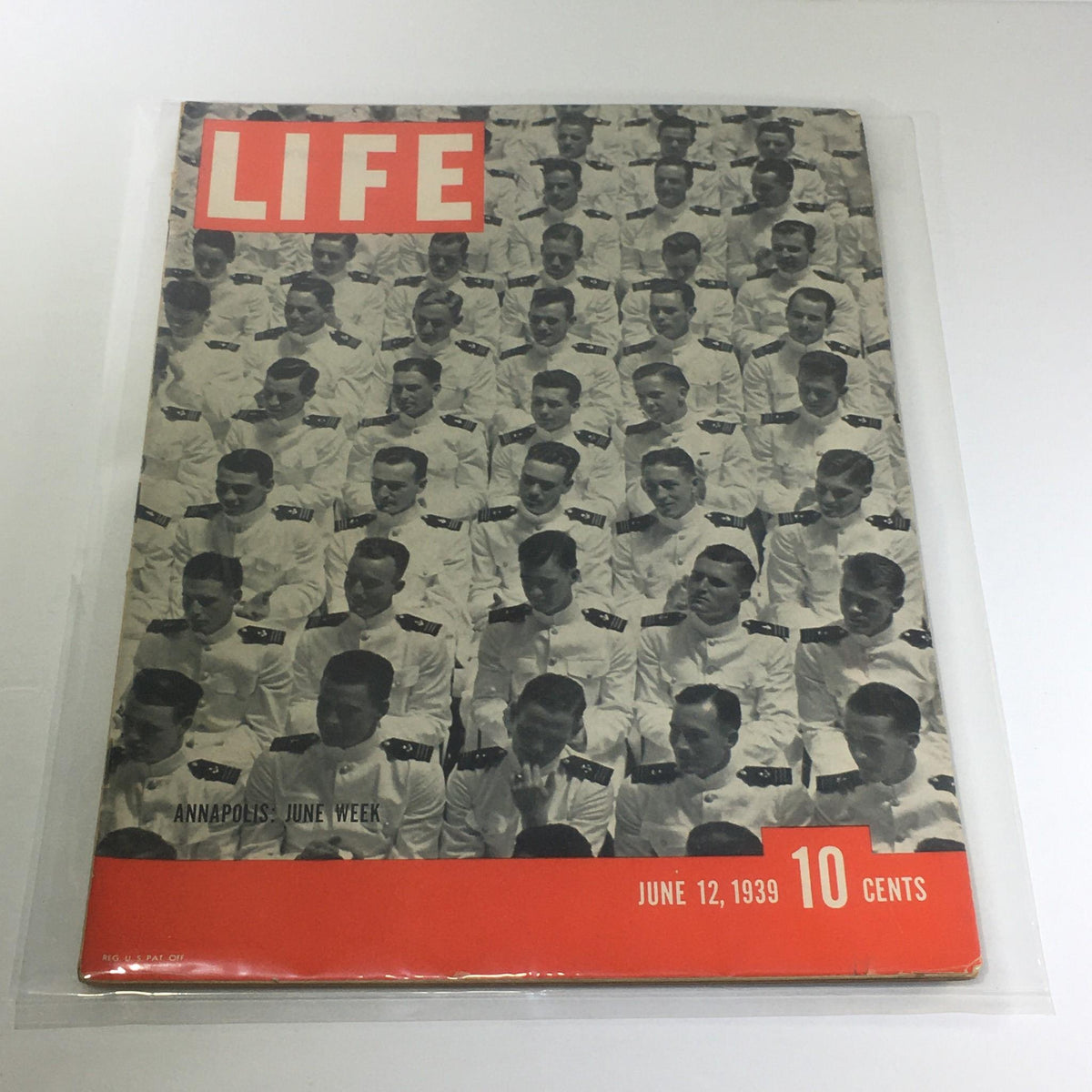 Cover of Vintage Life Magazine: June 12 1939 featuring Annapolis: June Week, showcasing a crowd of uniformed individuals, highlighting historical significance and cultural traditions of the era.