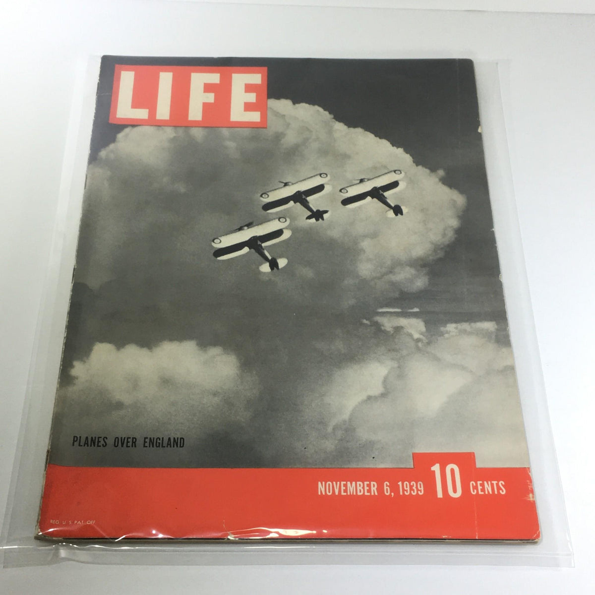 Vintage Life Magazine cover from November 6, 1939, featuring the title 'Planes Over England' with images of bi-planes flying through cloudy skies.