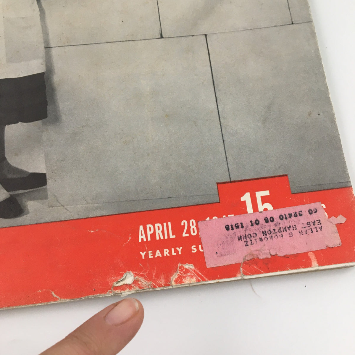 Close-up view of the vintage Life Magazine dated April 28, 1947, showing the bottom corner with minor wear and an address label affixed to the cover, emphasizing its collectible nature.