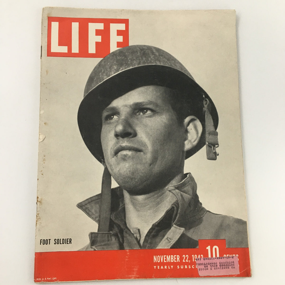 Cover of VTG Life Magazine November 22, 1943 featuring a foot soldier with a serious expression, highlighting themes of bravery during World War II.
