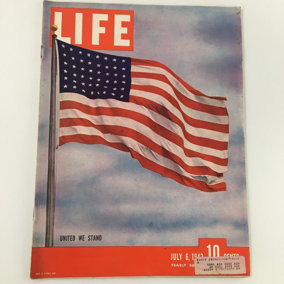Cover of VTG Life Magazine July 6 1942, featuring the iconic Flag of the United States with the theme 'United We Stand'.