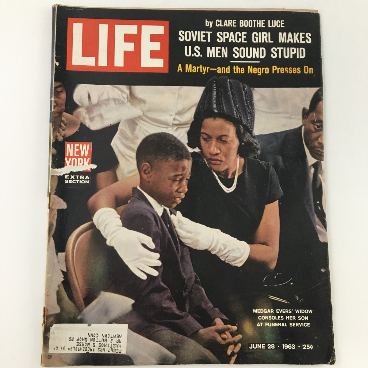 Cover of VTG Life Magazine dated June 28, 1963, featuring a poignant image of Medgar Evers' widow consoling her son at his funeral, highlighting the themes of loss and resilience.