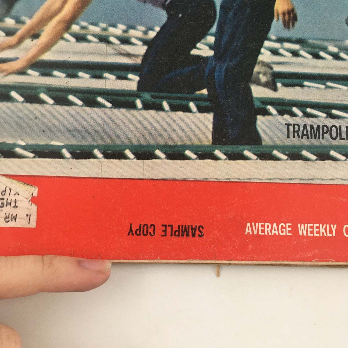 Close-up view of the bottom of the VTG Life Magazine May 2, 1960 cover, emphasizing the 'Sample Copy' label and vintage design.