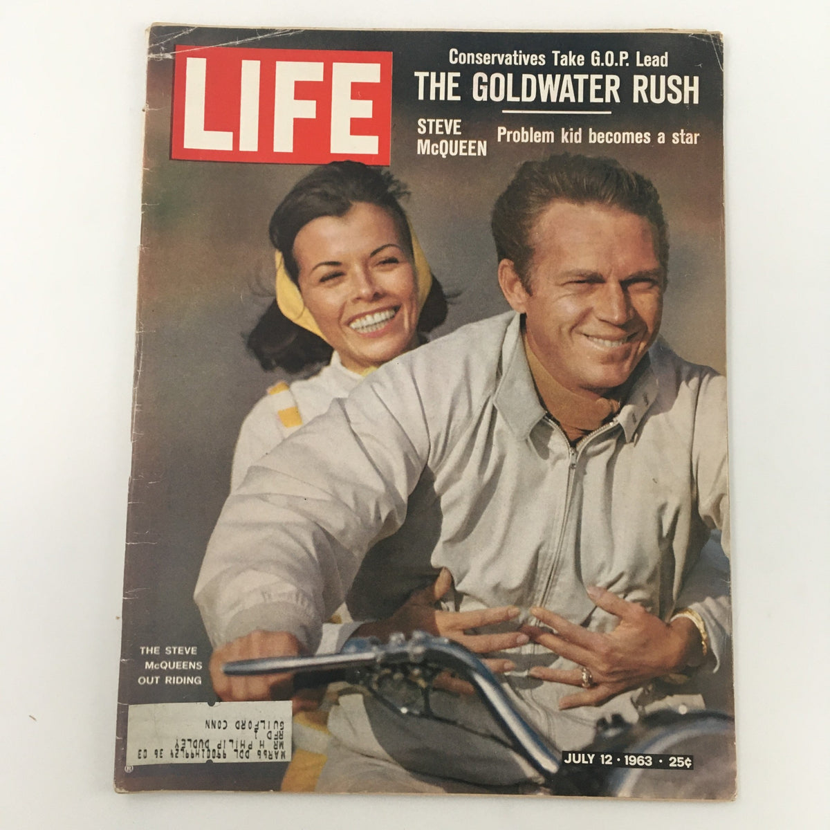 Vintage Life Magazine from July 12, 1963 featuring Steve McQueen and his wife Barbara Minty on the cover, showcasing a moment from their lives during McQueen's peak stardom.