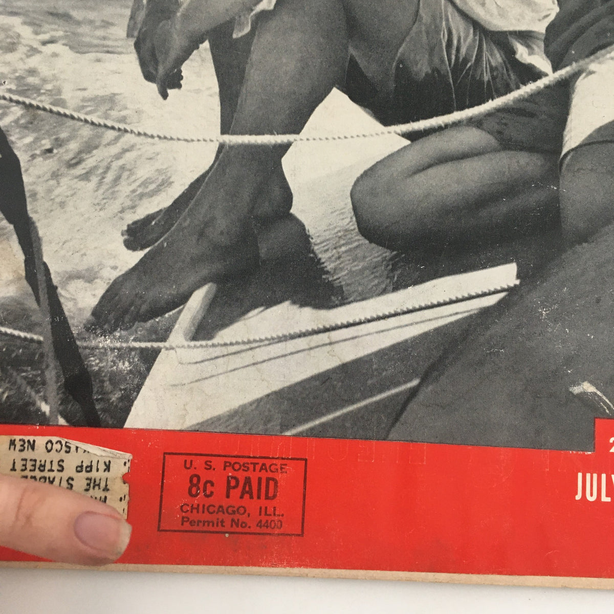 Close-up view of the bottom section of VTG Life Magazine from July 20, 1953, displaying the price and postal details, with the title 'John Kennedy Goes A Courting to Young Jackie' highlighted.
