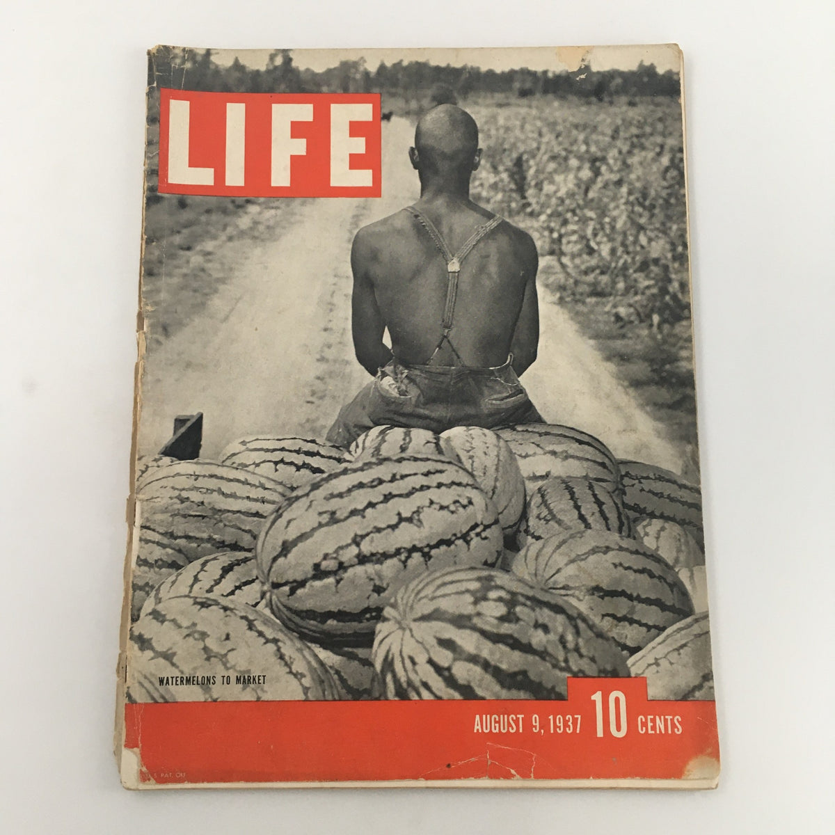 VTG Life Magazine August 9 1937 cover featuring a man with his back turned sitting on a cart full of watermelons, reflecting agricultural life during the Great Depression.