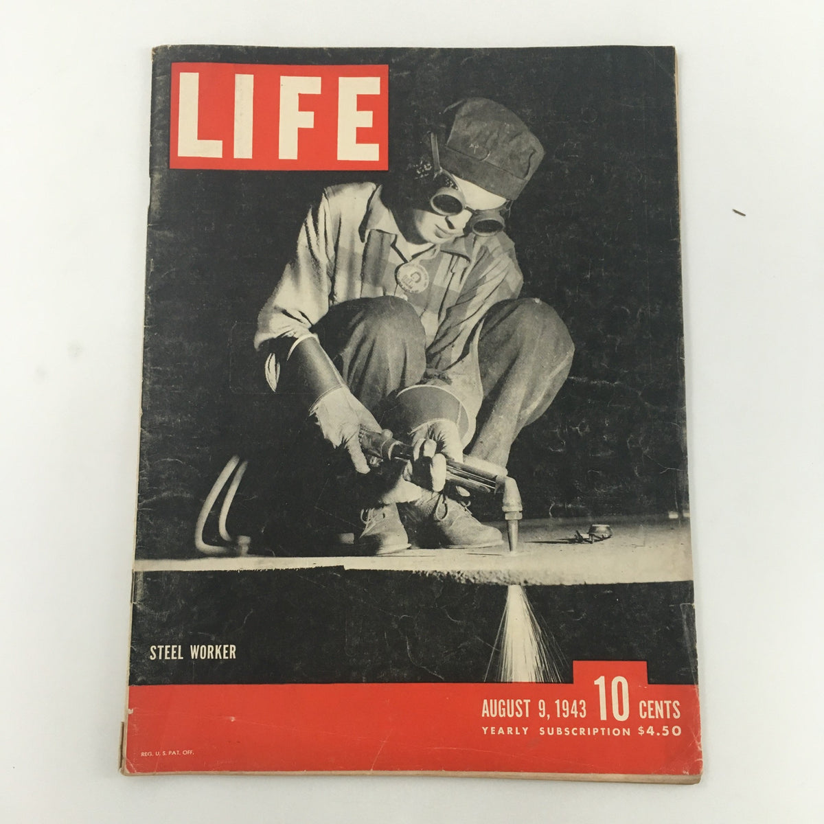 Cover of VTG Life Magazine dated August 9, 1943, featuring a steel worker. The image showcases the resilience of the workforce during World War II, with the magazine's title prominently displayed.