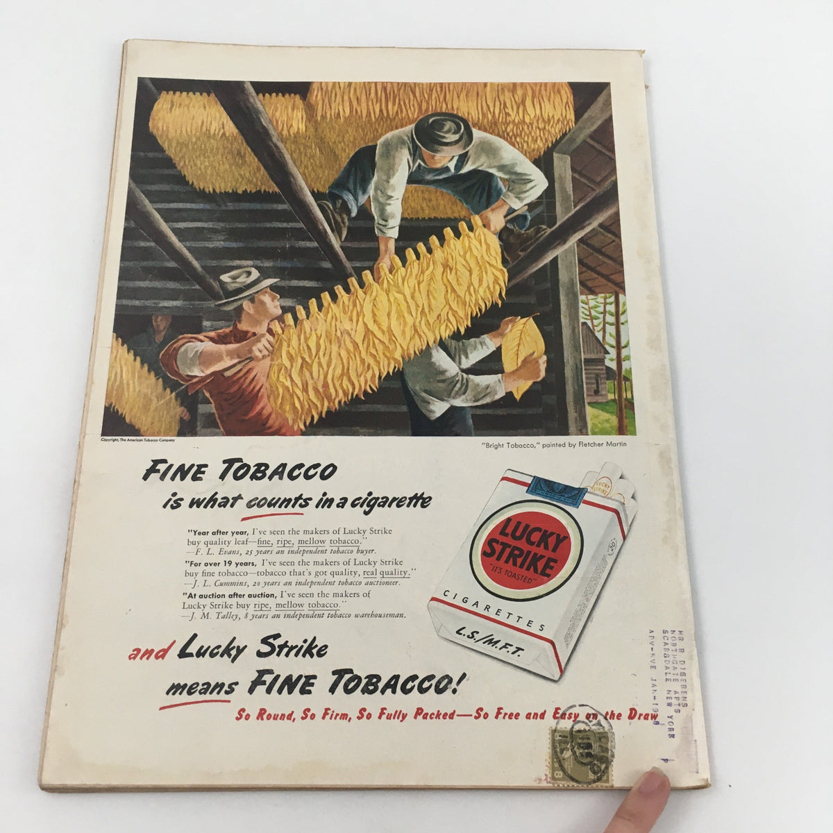 Back cover of Life Magazine August 11, 1947 featuring a Lucky Strike cigarette advertisement with tobacco workers, illustrating mid-20th century advertising style.