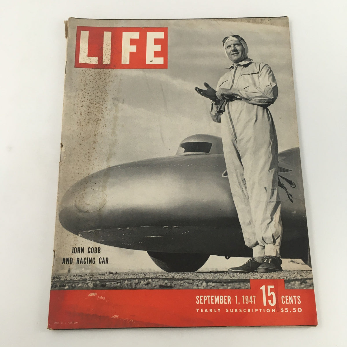 Cover of Life Magazine September 1, 1947 featuring John Cobb and Racing Car with a vintage design and sepia tone.