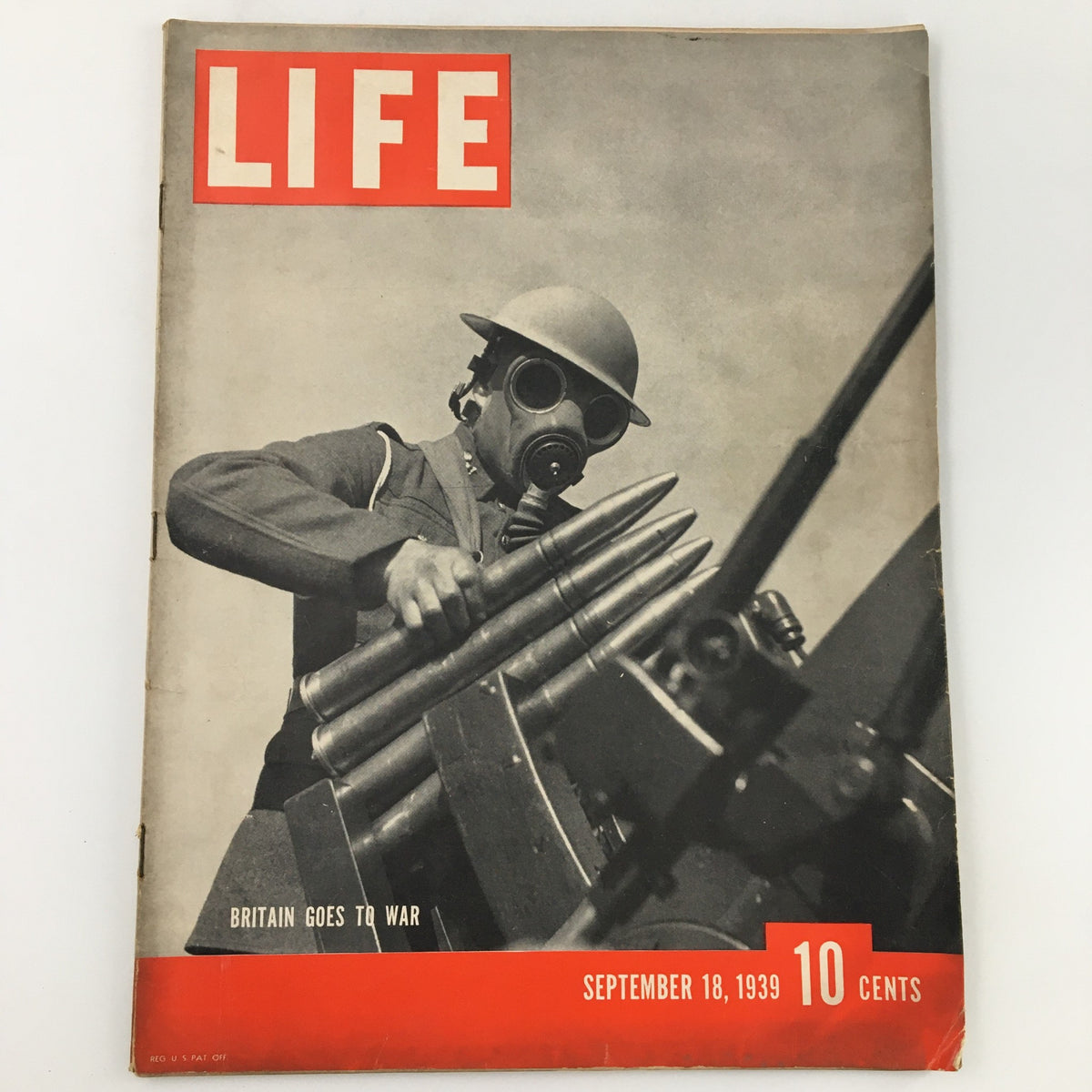 VTG Life Magazine September 18 1939 cover featuring a soldier in a gas mask holding artillery shells with a bold 'LIFE' title and 'BRITAIN GOES TO WAR' text.