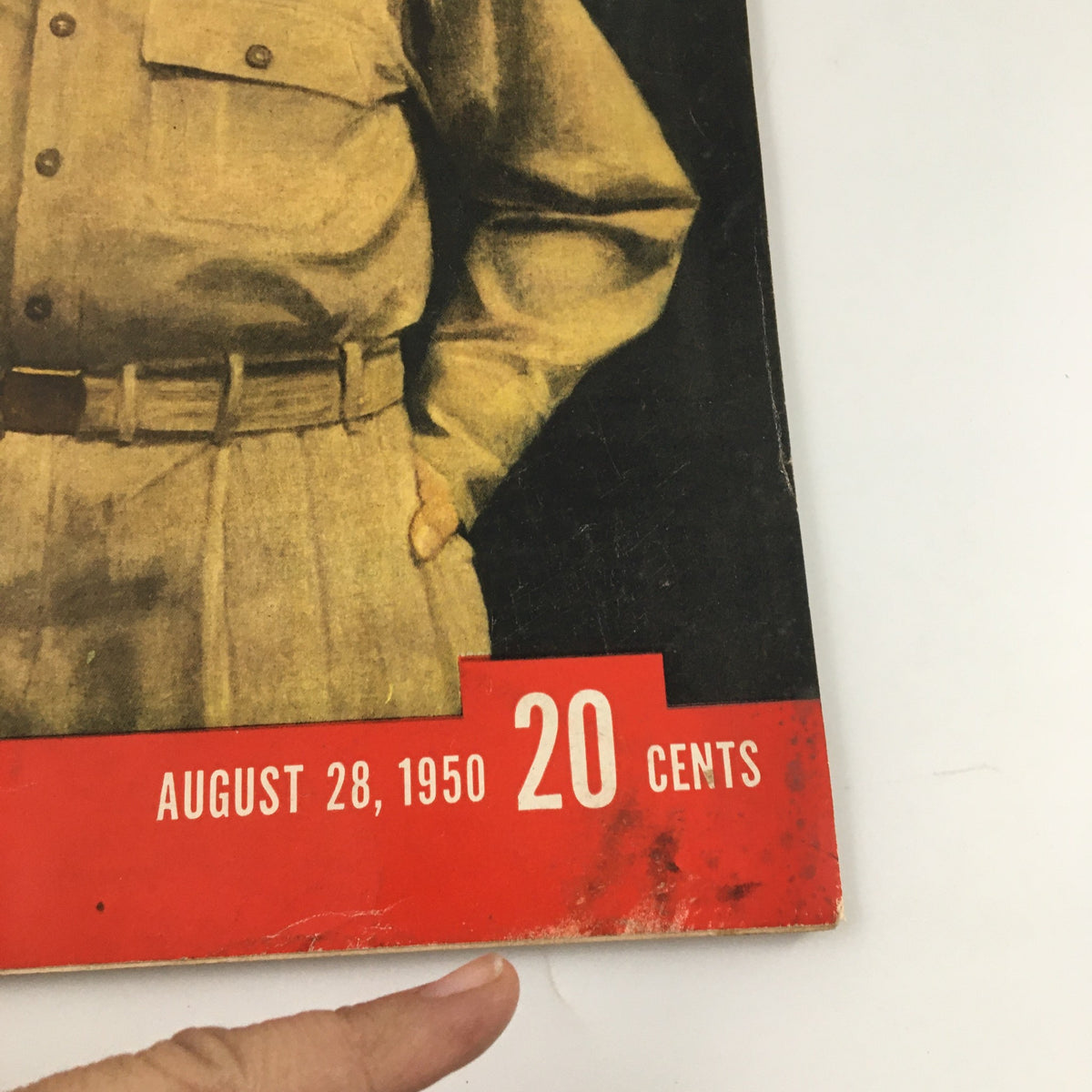 Close-up of the Life Magazine cover dated August 28, 1950, highlighting details of the price and date alongside a new portrait of Douglas MacArthur.