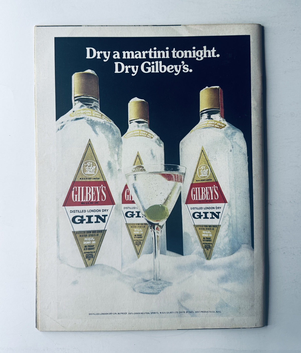 Advertisement page from Time Magazine September 8, 1975 showcasing Gilbey's gin with a martini and the tagline 'Dry a martini tonight. Dry Gilbey's.'