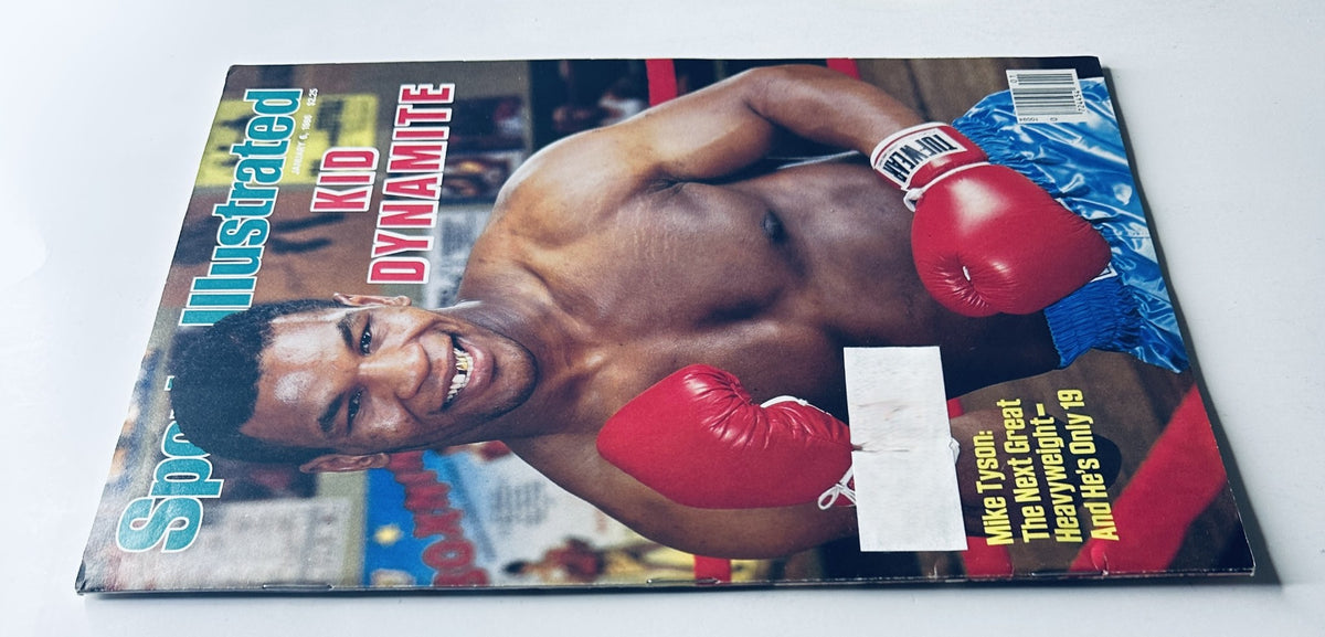 Back cover of Sports Illustrated Magazine January 6, 1986 highlighting Mike Tyson, Kid Dynamite, in an action pose with boxing gloves.