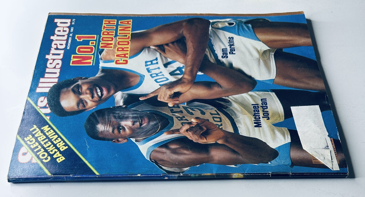 Cover of Sports Illustrated Magazine, November 28, 1983 featuring Michael Jordan and Sam Perkins from UNC, showcasing college basketball highlights.