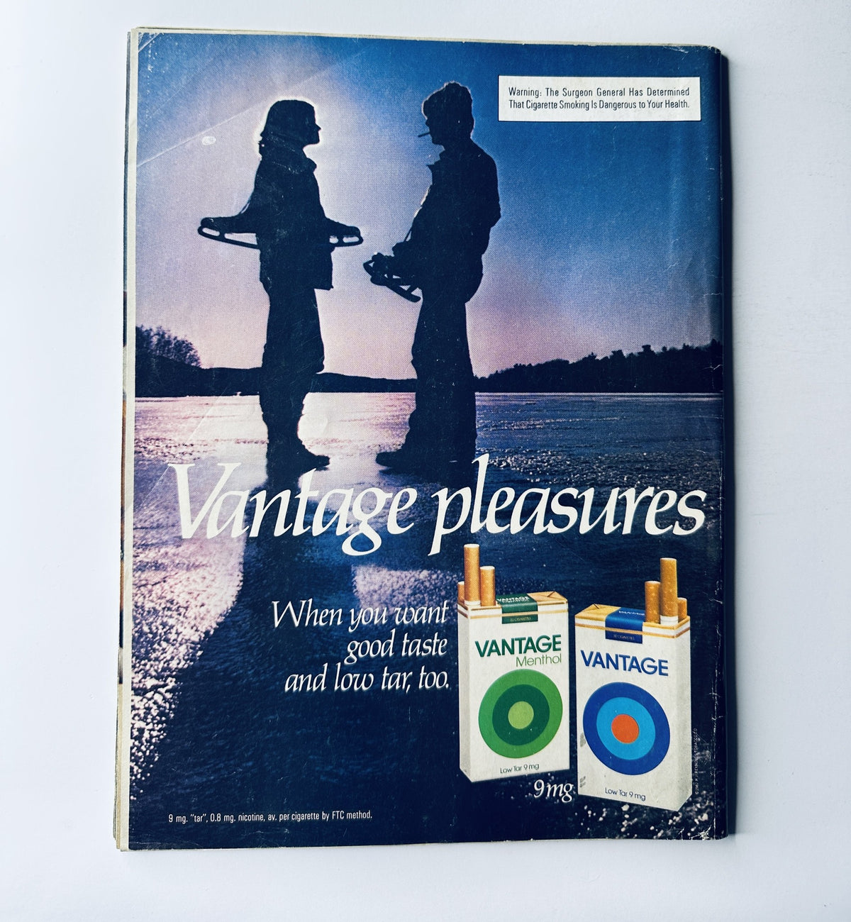 Back cover of a Sports Illustrated Magazine from January 11, 1982, featuring a cigarette advertisement for Vantage, showcasing two individuals against a scenic background.