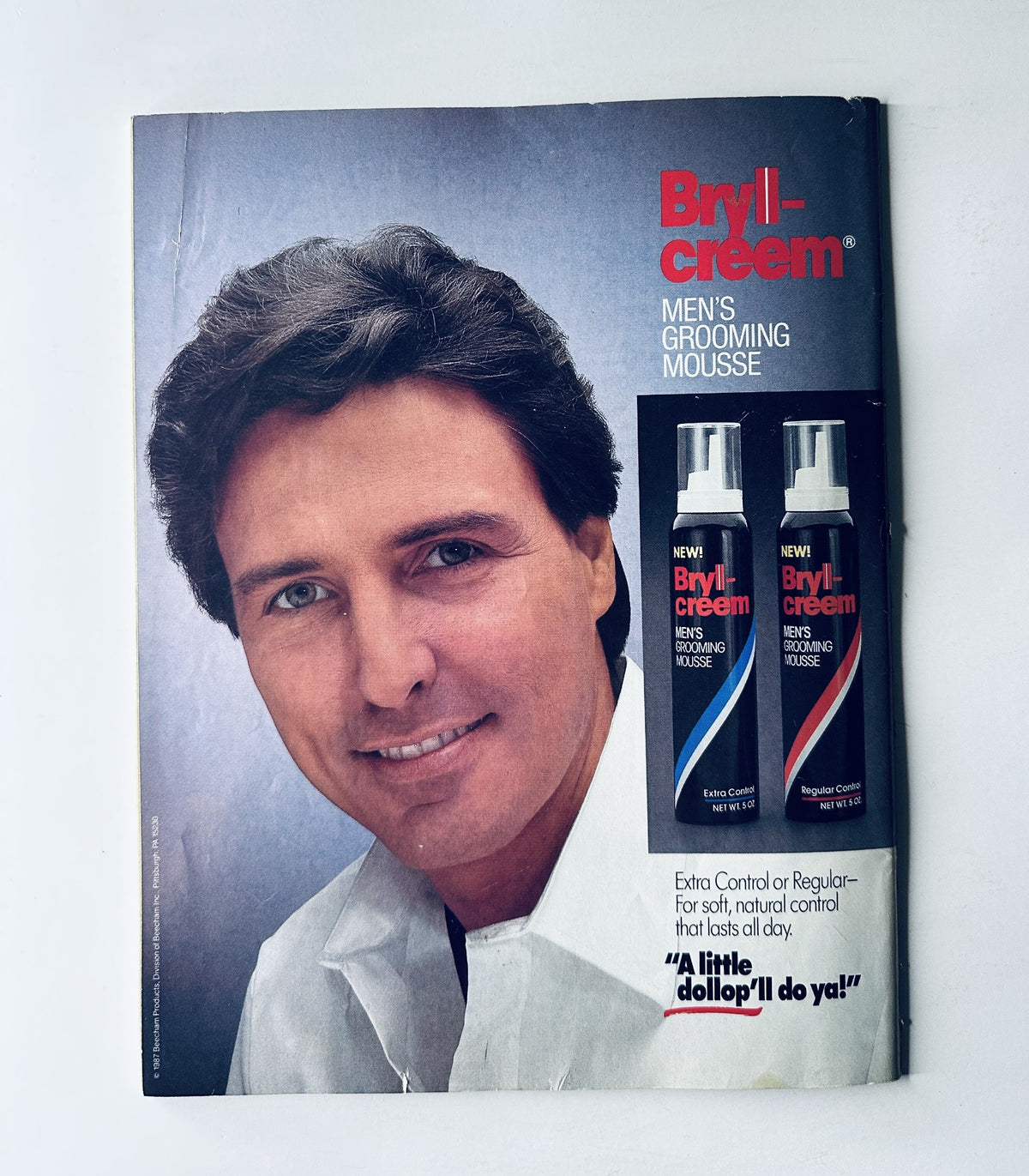 Advertisement for Brylcreem Men's Grooming Mousse featured in WWF Magazine May 1988.