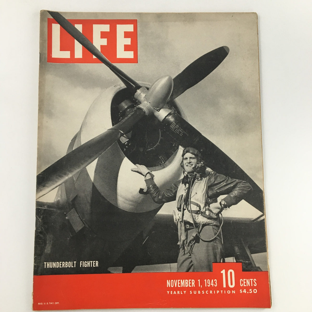VTG Life Magazine cover from November 1, 1943 featuring a Thunderbolt Fighter aircraft and a pilot, showcasing classic wartime photography and vintage magazine aesthetics.