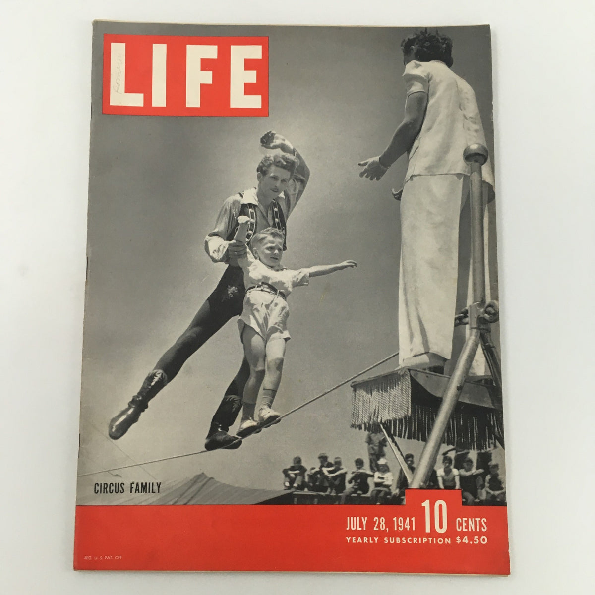 VTG Life Magazine July 28 1941 featuring a circus family on the cover with an acrobat and a child performing a balancing act, reflecting the charm and allure of circus life.