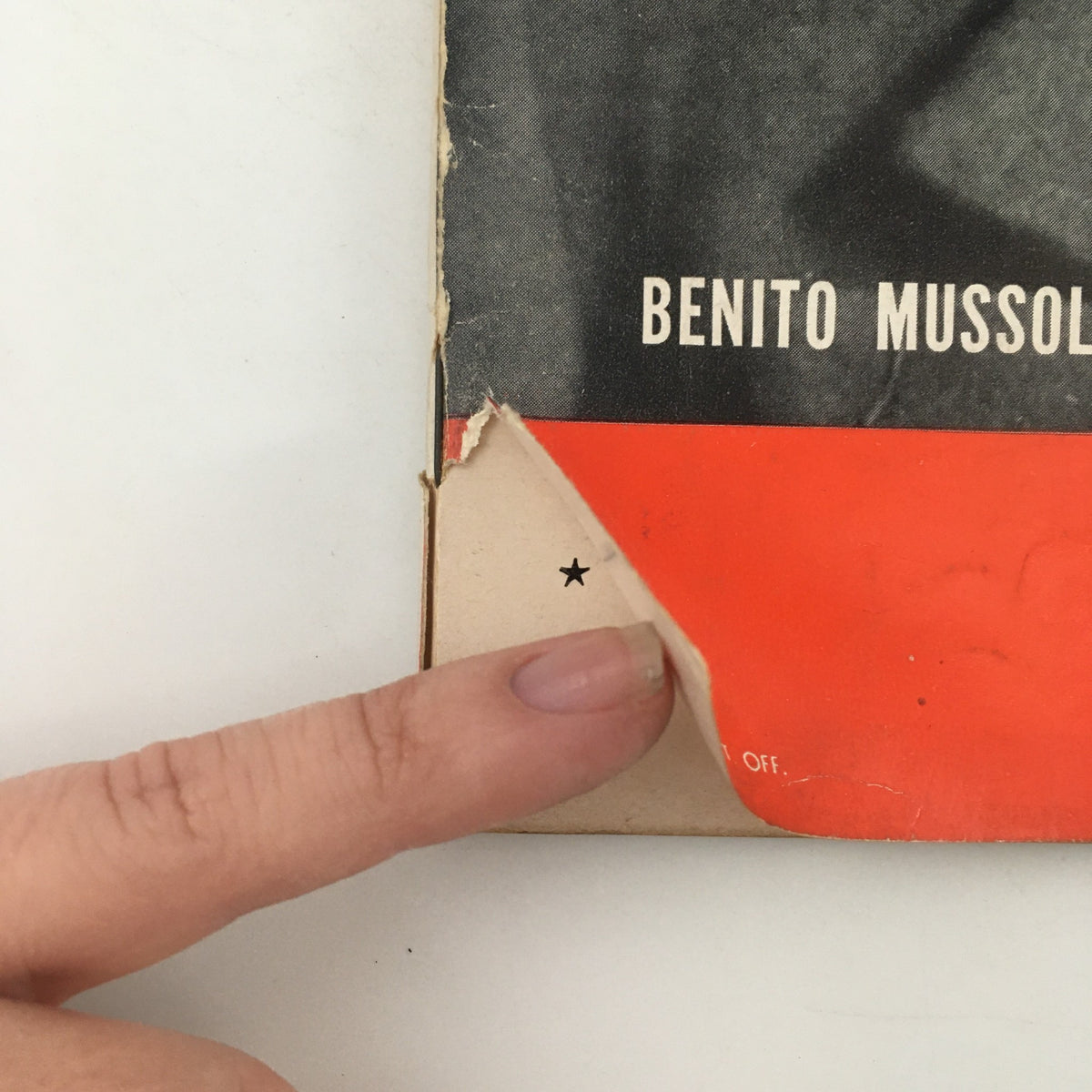 Close-up of the cover of the VTG Life Magazine from September 11, 1939 featuring Prime Minister Benito Mussolini, showcasing minor wear with a finger lifting a corner of the cover.