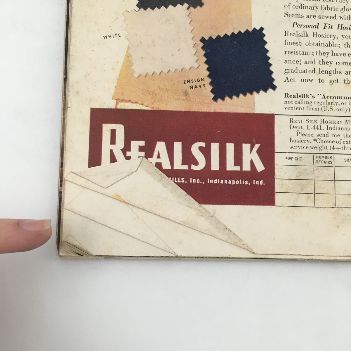 Back cover of VTG Life Magazine April 14 1941, displaying fabric samples labeled 'RealSilk,' highlighting vintage fashion details.