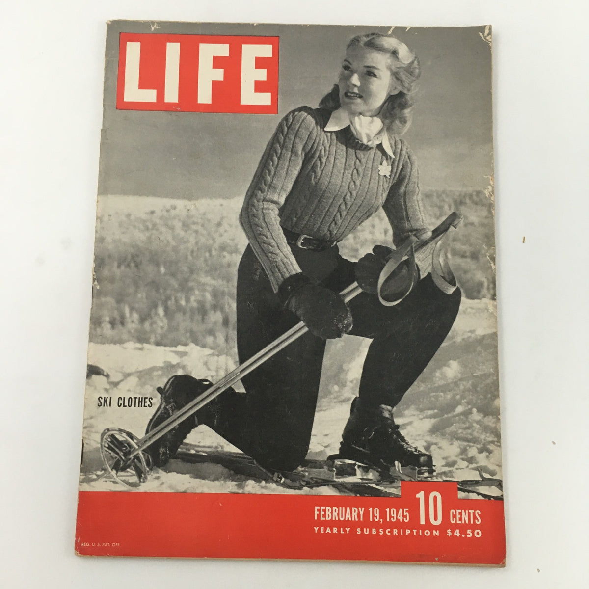 Cover of VTG Life Magazine February 19, 1945 featuring ski teacher Blanche Rybizka. The magazine showcases a stylish woman in winter sports attire, skiing gear, and the iconic Life Magazine branding, reflecting post-war American culture.