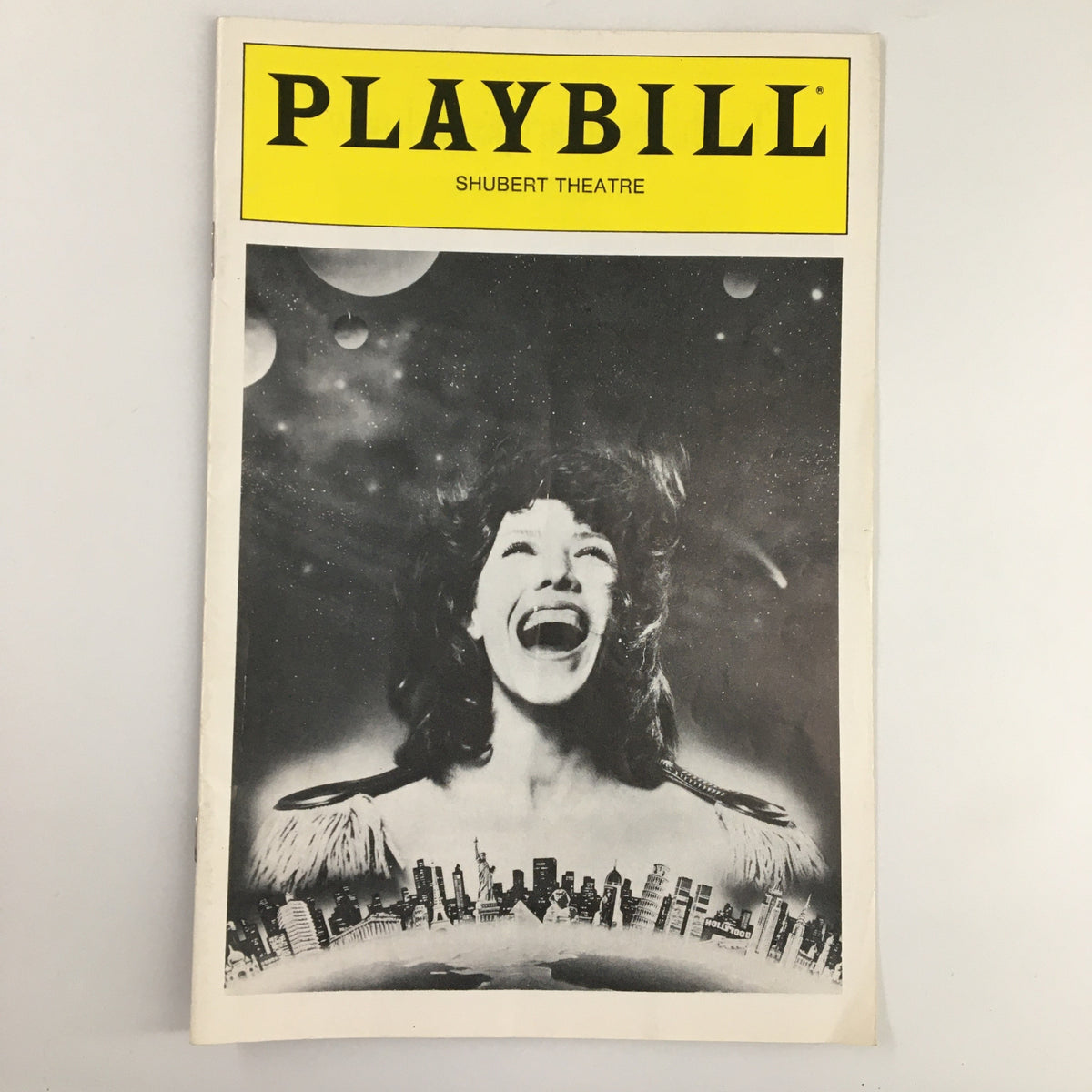 Playbill for The Search for Signs of Intelligent Life in the Universe from Shubert Theatre, April 1989, featuring a striking cover design and iconic imagery.