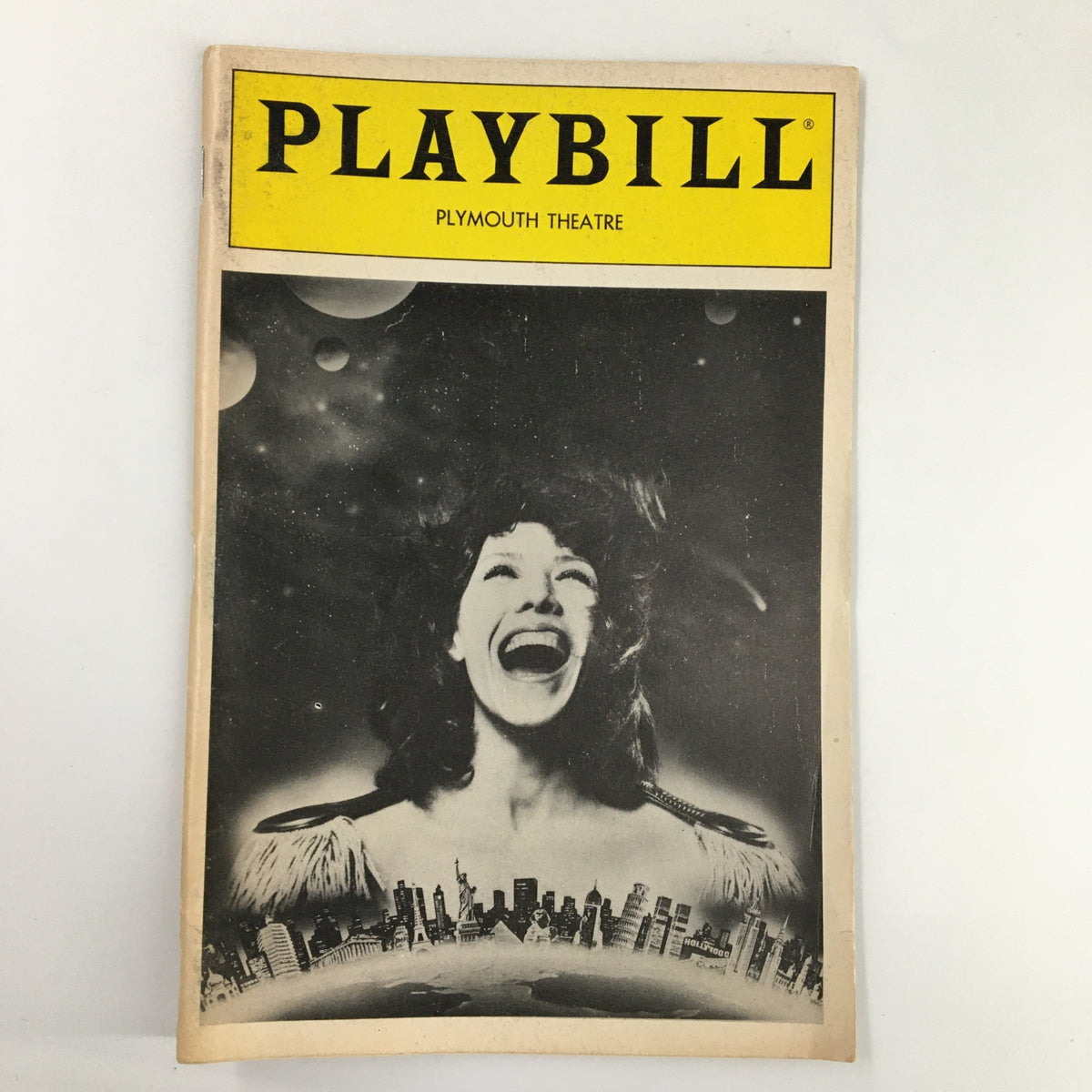 Playbill January 1986 featuring Lilly Tomlin at Plymouth Theatre in The Search for Signs of Intelligent Life in the Universe, showcasing her iconic performance with a black and white cover.