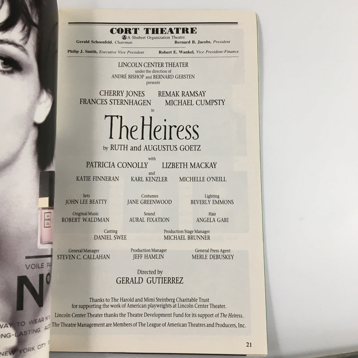 Interior page of the 1995 Playbill for The Heiress showcasing advertisements and additional theater information.