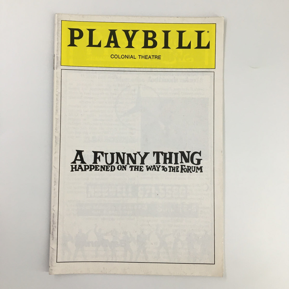 1987 Playbill from the Colonial Theatre featuring 'A Funny Thing Happened on the Way to the Forum' with bold title display.
