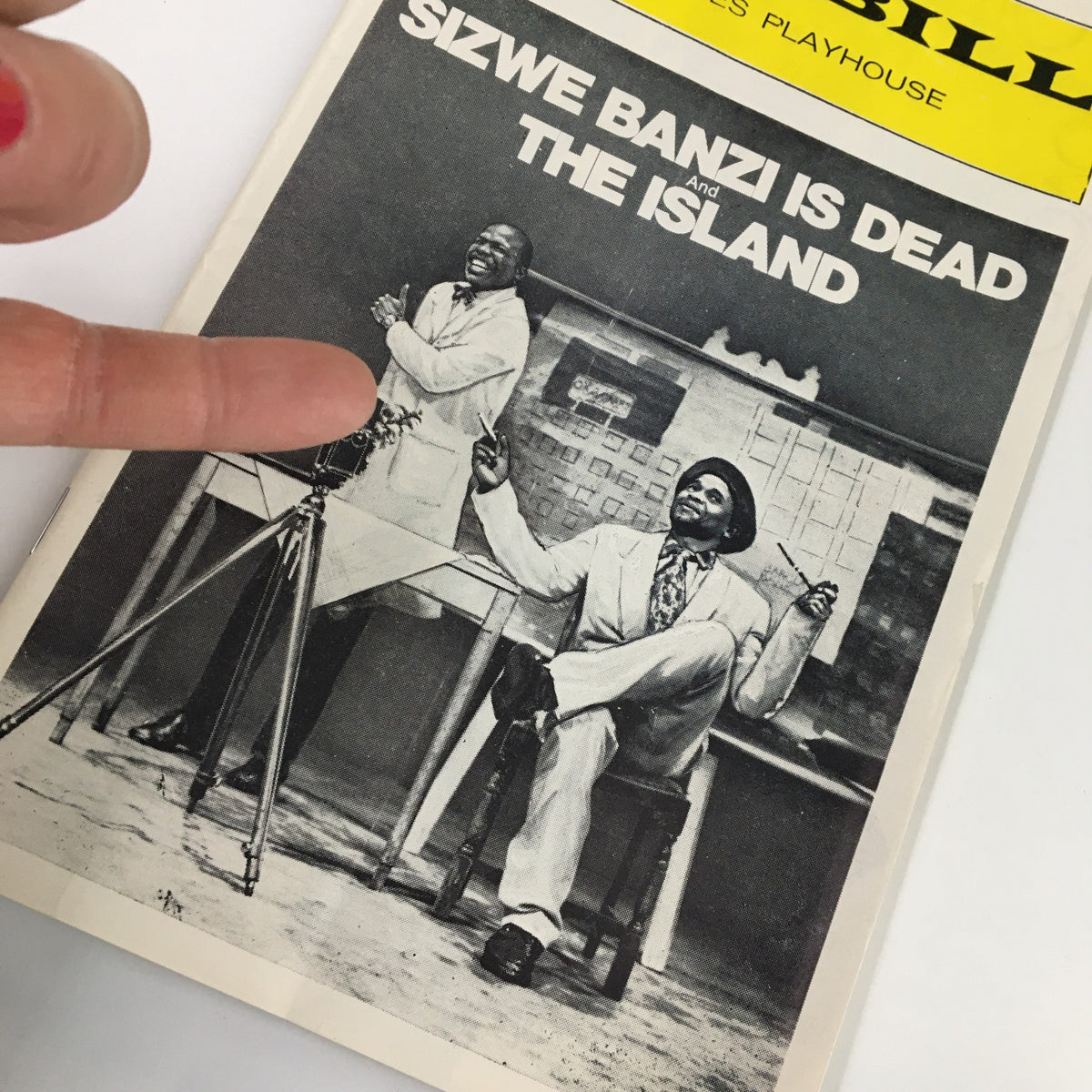 Closer view of the 1975 Playbill for 'Sizwe Banzi is Dead' highlighting the performance by John Kani and Winston Ntshona.