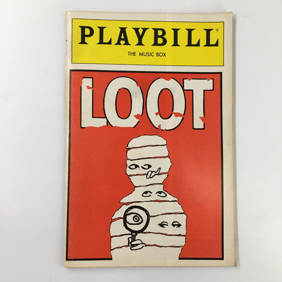 1986 Playbill for Loot by Joe Orton featuring the iconic cover design with a red background and artwork of a mummy figure.