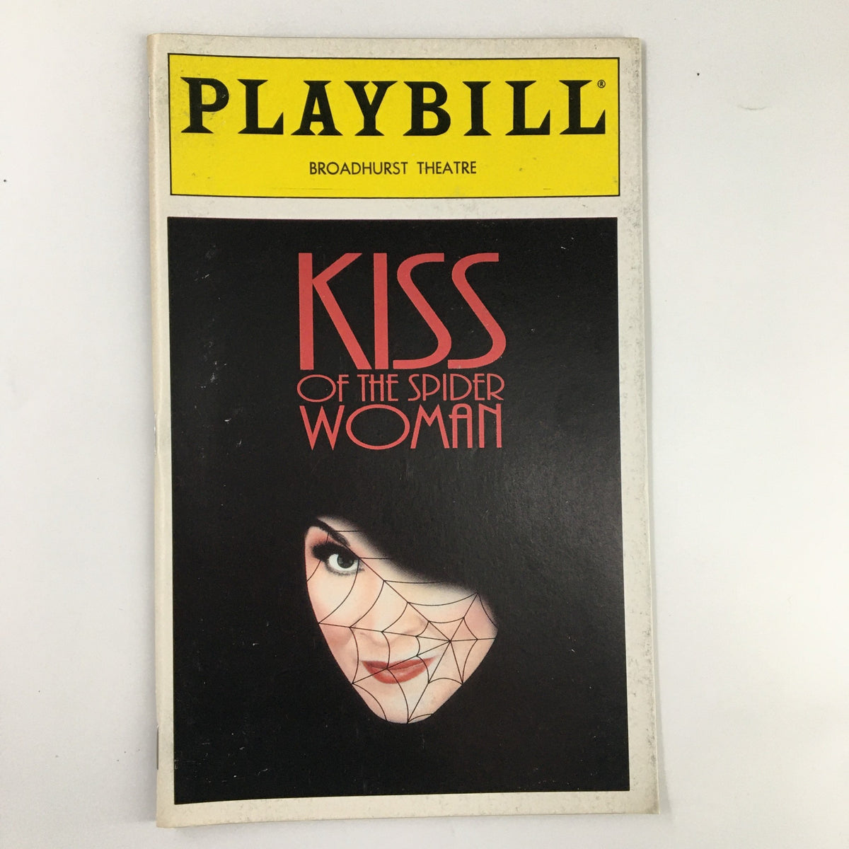 1993 Playbill for Kiss of the Spider Woman featuring Chita Rivera, showcasing a striking cover design with a spider web and dramatic artwork.