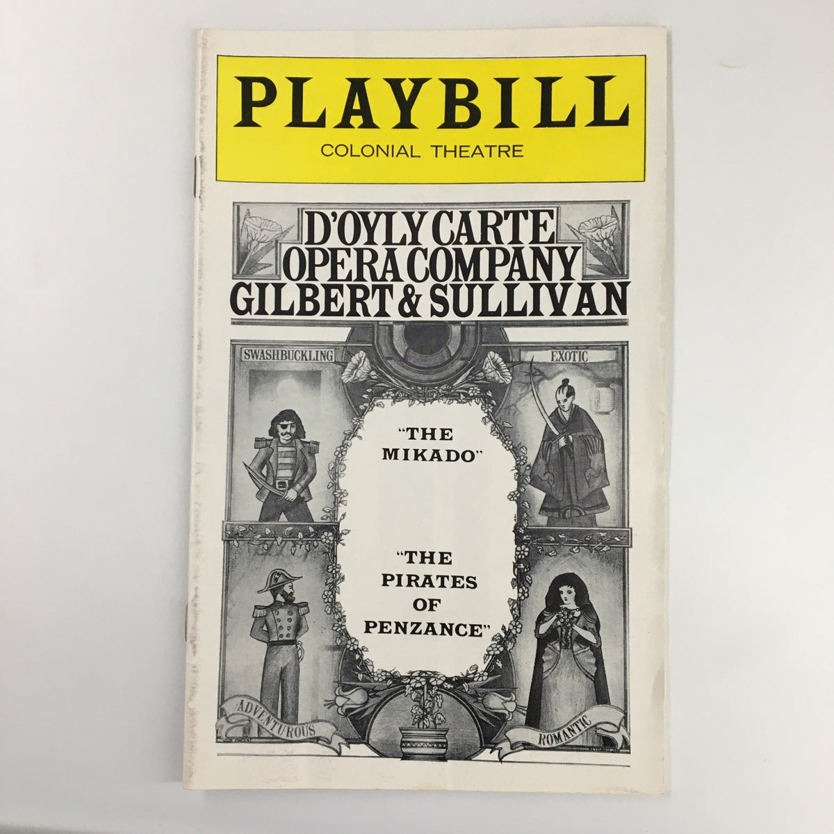 1976 Playbill The Colonial Theatre D'Oyly Carte featuring Gilbert & Sullivan artwork, showcasing 'The Mikado' and 'The Pirates of Penzance'.