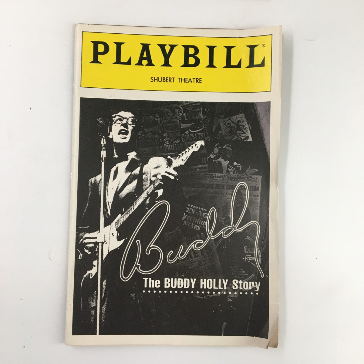 1991 Playbill for The Buddy Holly Story featuring a black and white image of a performer and the title prominently displayed at the top.