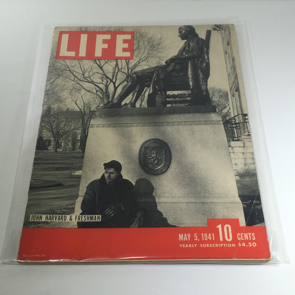 Vintage Life Magazine May 5, 1941 cover featuring John Harvard and Freshman, showcasing an iconic photograph of the John Harvard statue and a student on the campus.