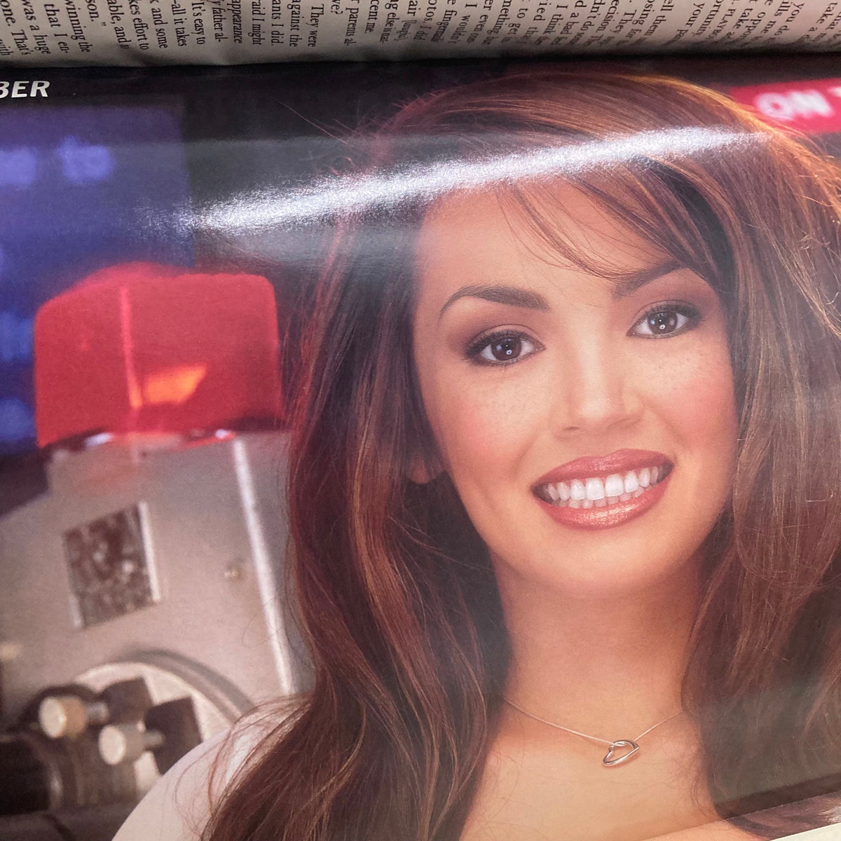 Inside view of Playboy Magazine October 1999 featuring a portrait of Jennifer Rovero with captivating photography, highlighting her charming smile.